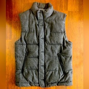 Wool puffer vest with smooth lining.